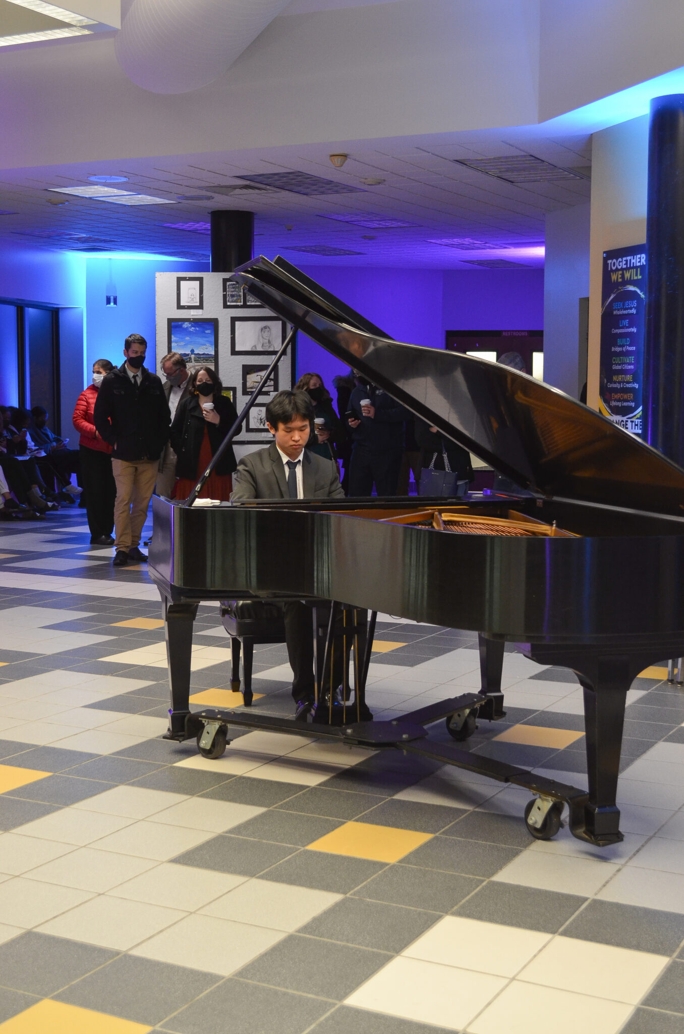 lm student playing grand piano