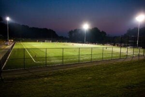 LM turf field at night with stadium lights on