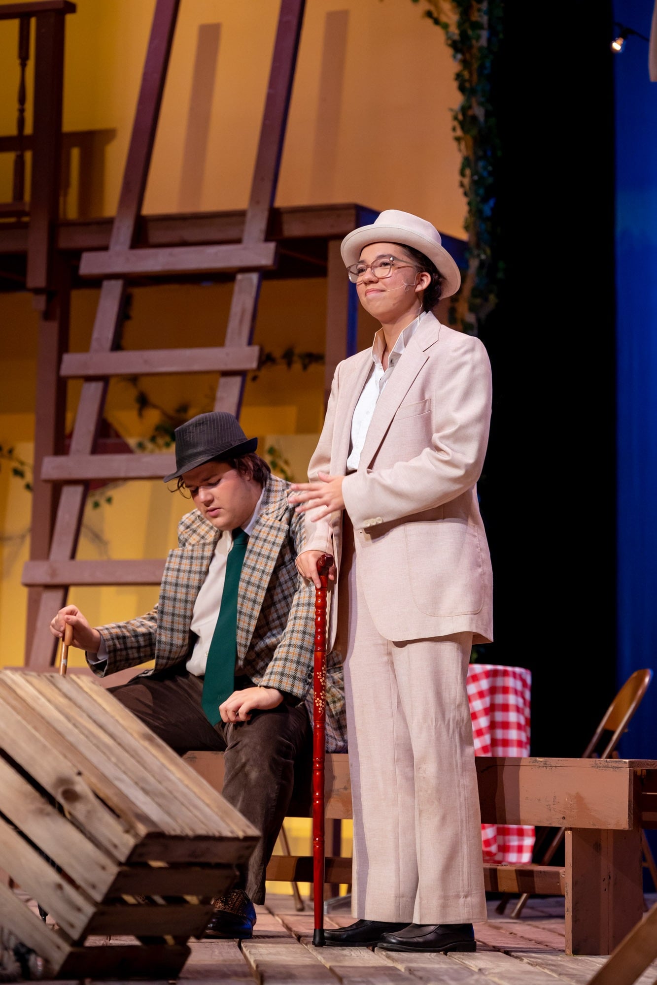 two actors gaze at audience