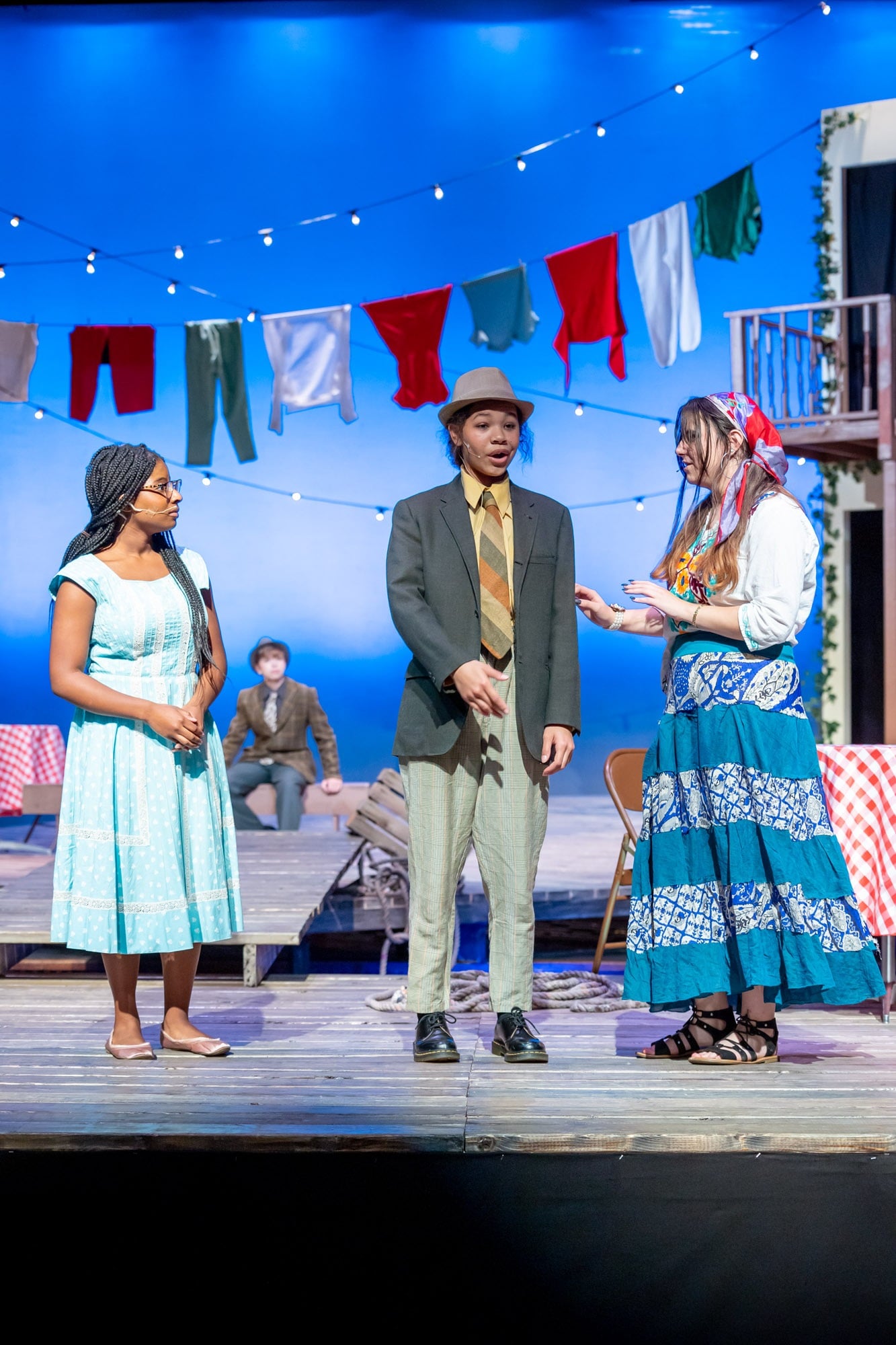 three women on stage