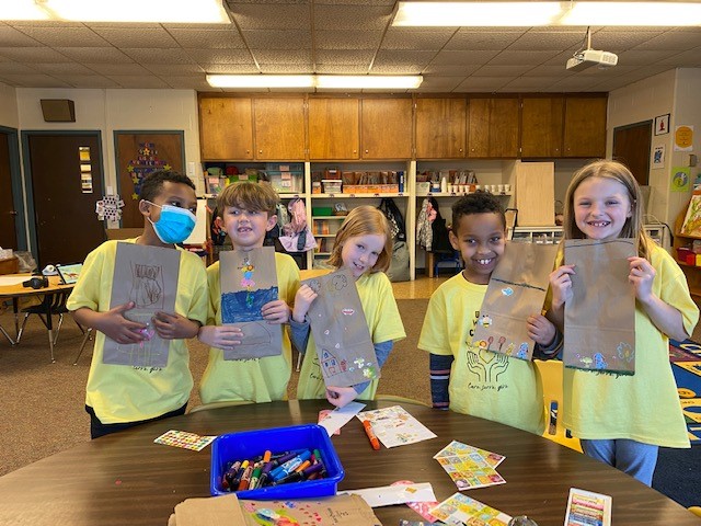 Students holding up bags- World Changer Day 2022