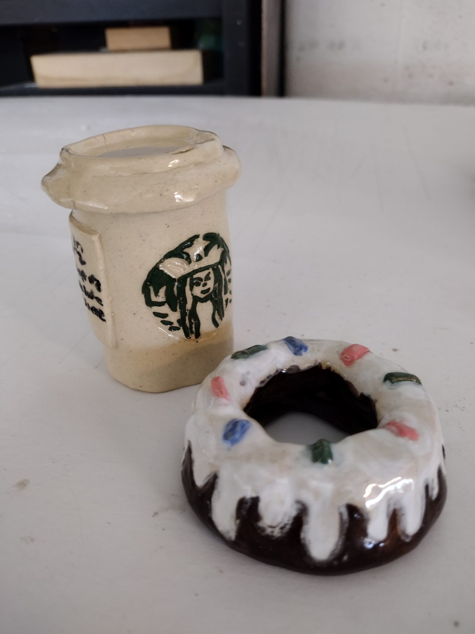 ceramic coffee up and donut