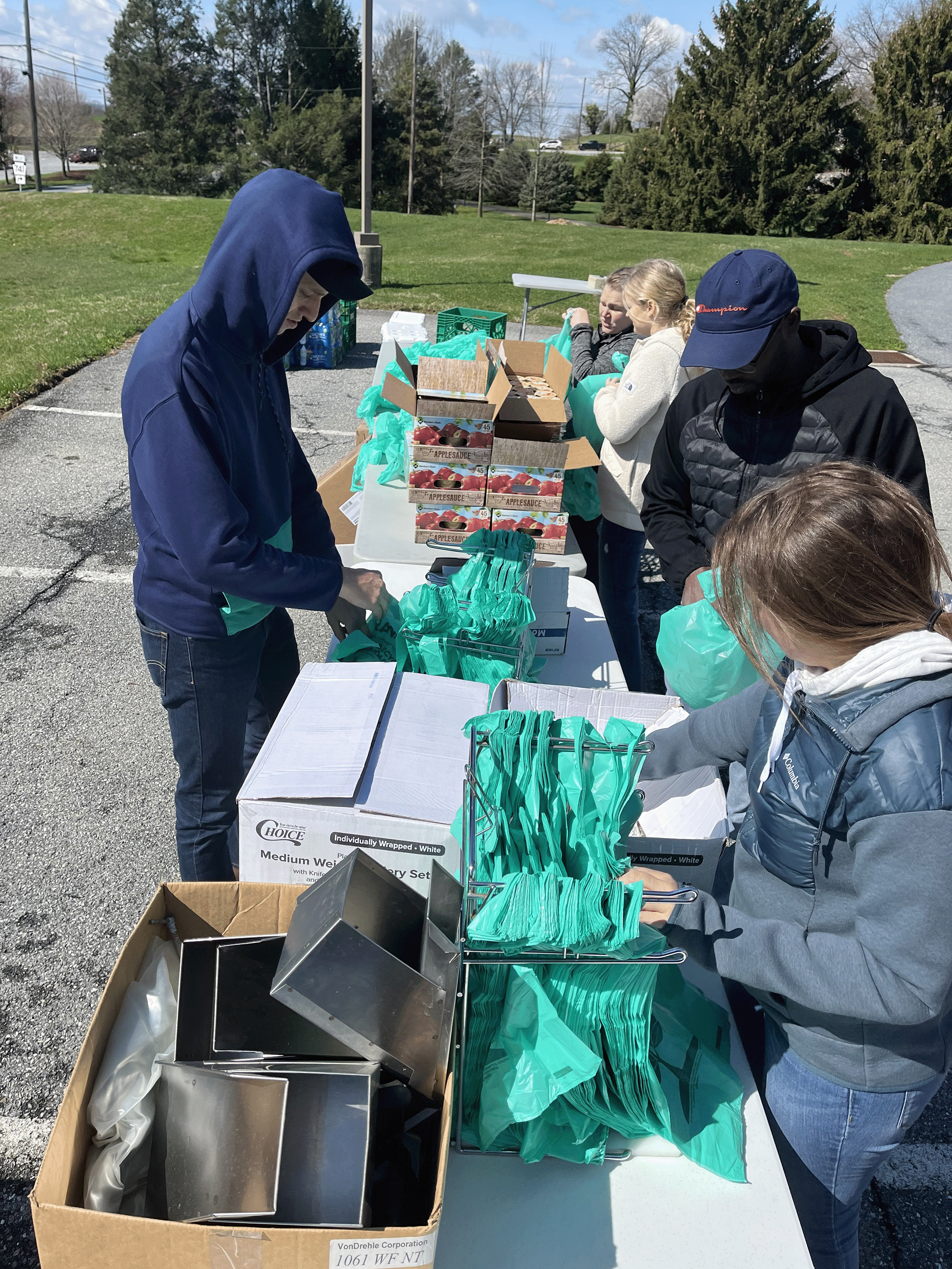 students working food table