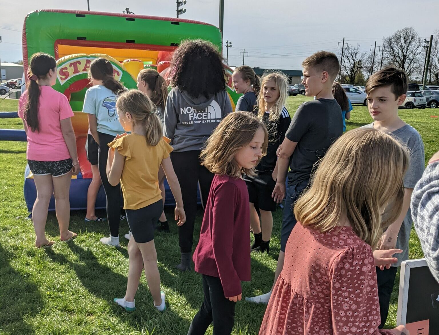 kids in line for bounce house