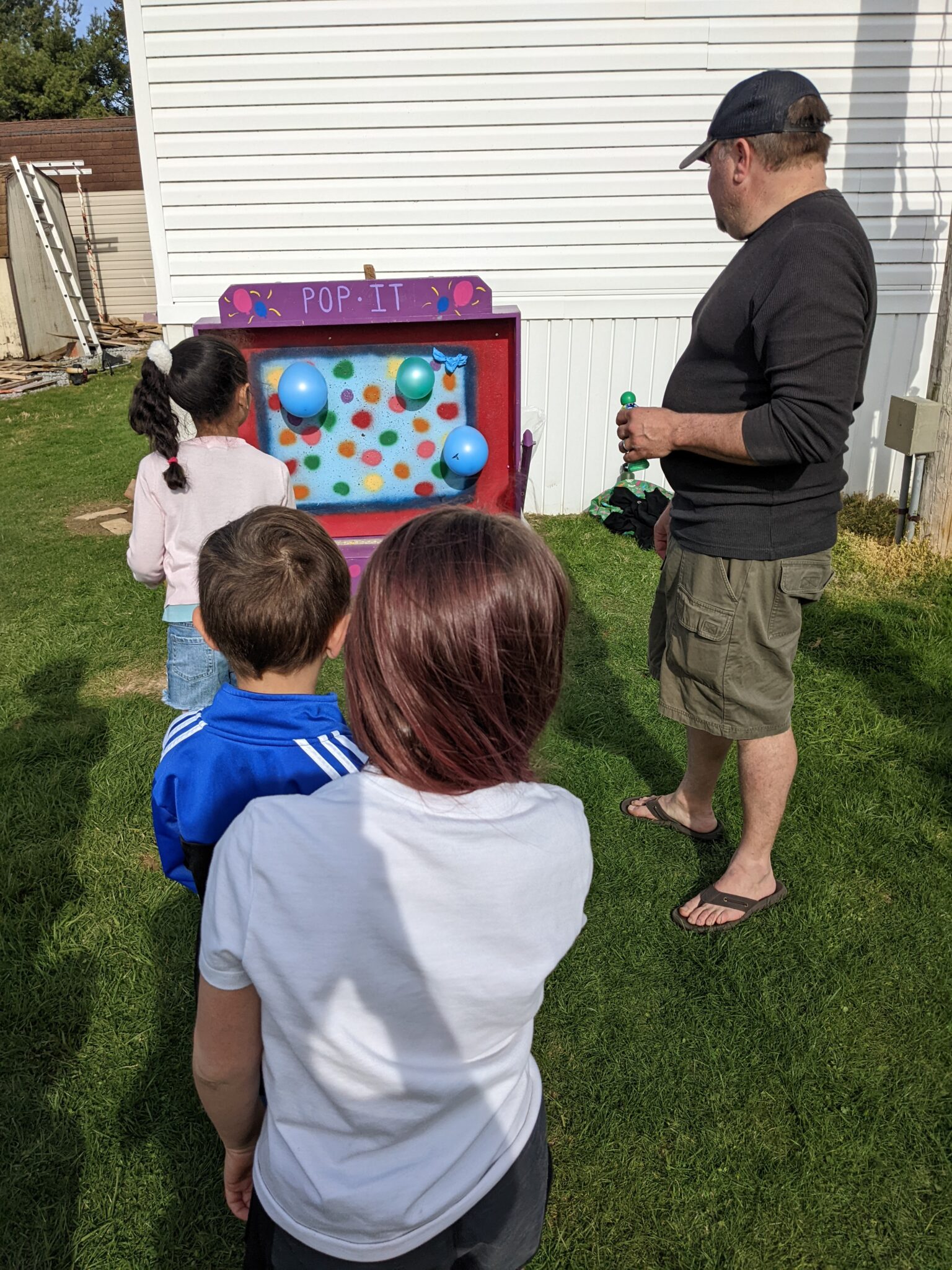 kids in line to play balloon game