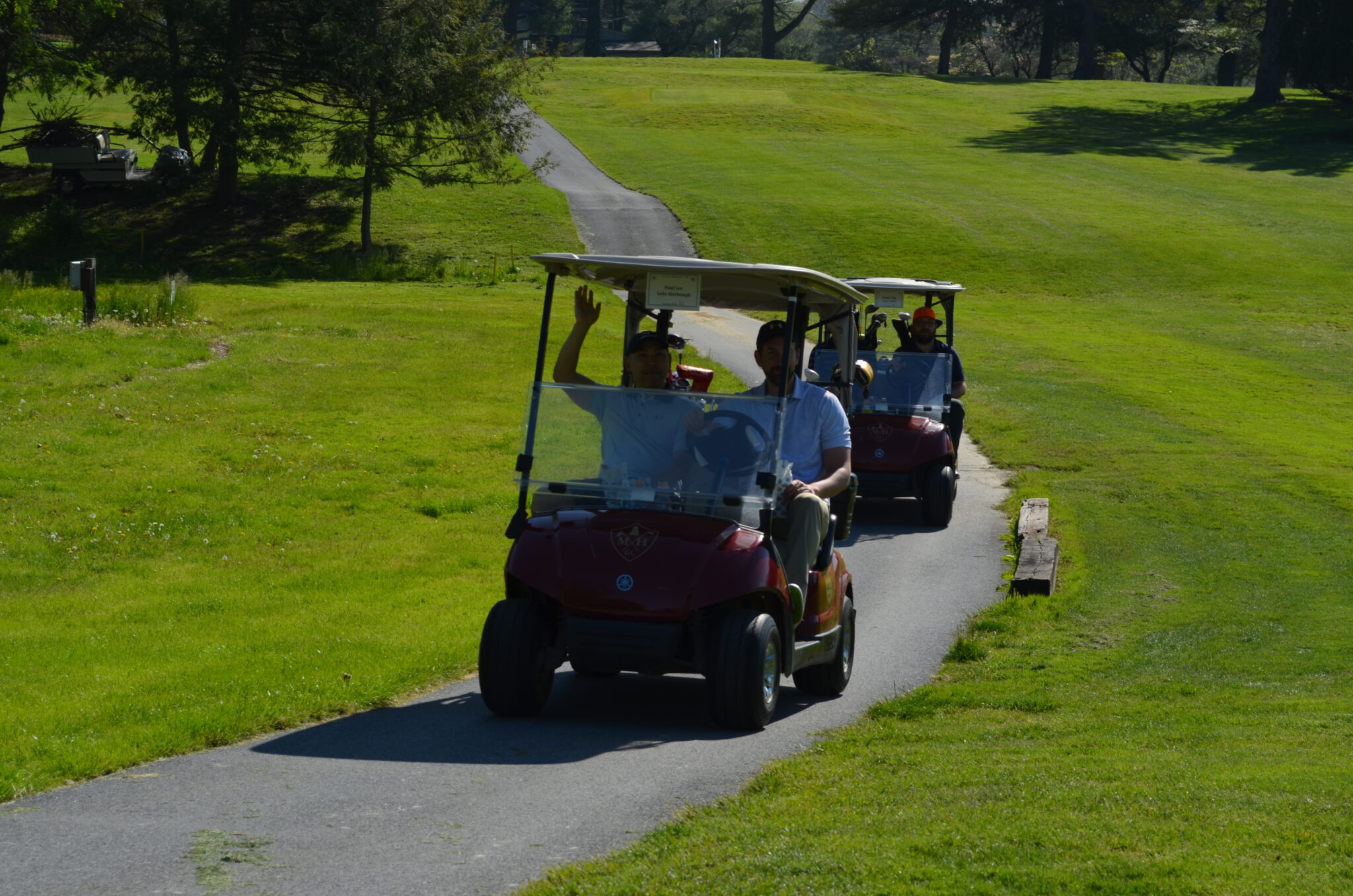 group in two golf carts