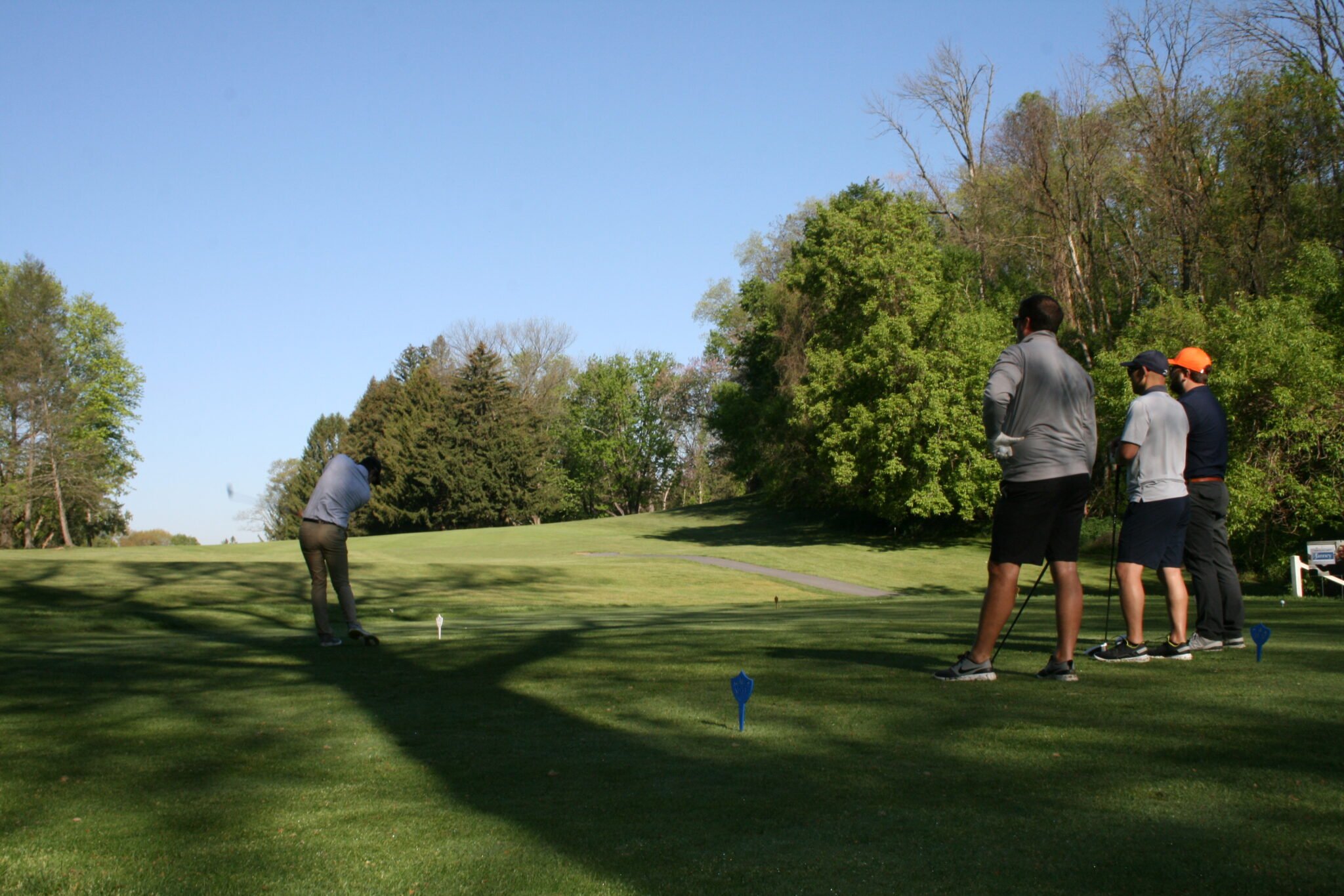 golfing team on the green