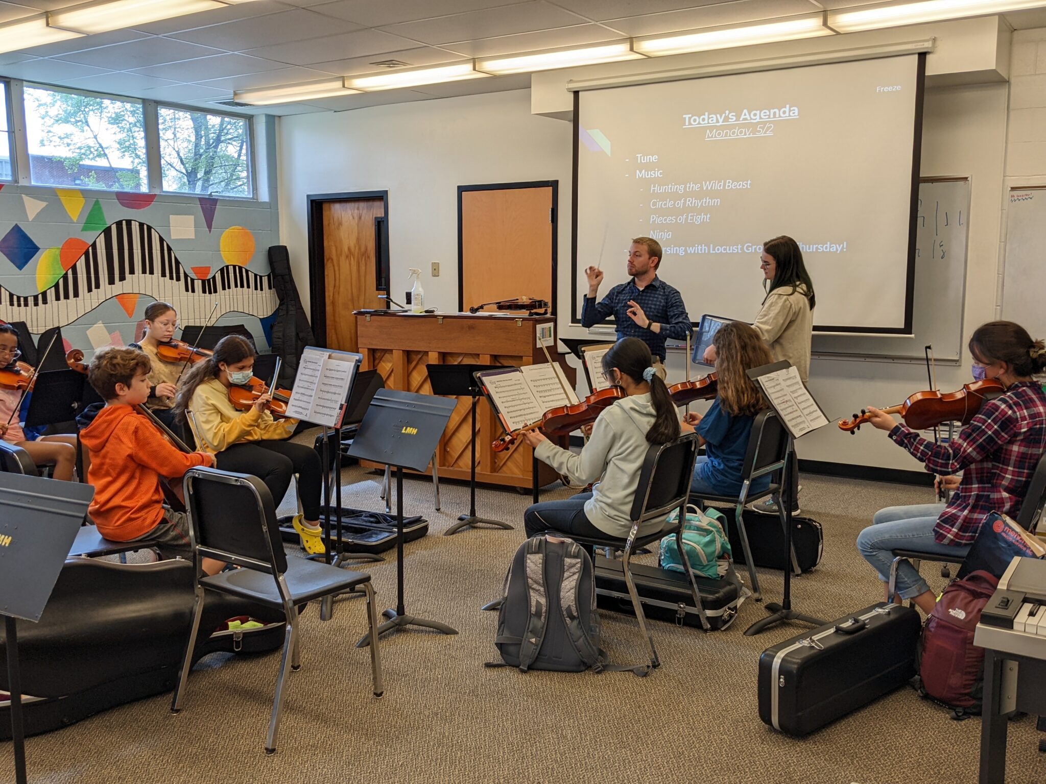 students playing violins