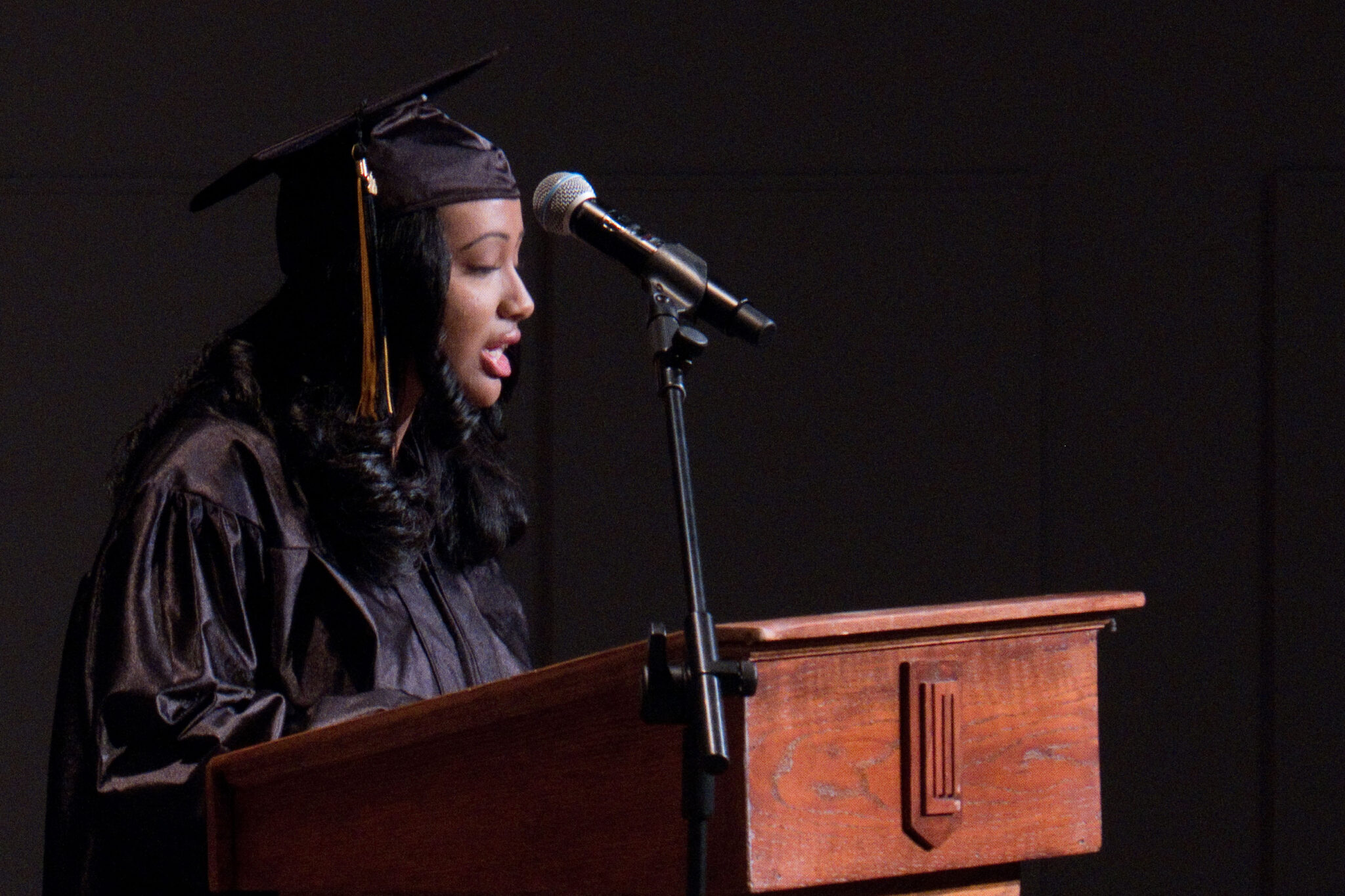 student speaking at podium