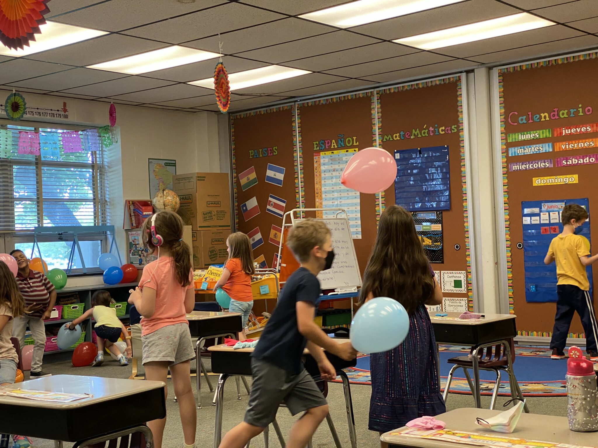 students playing in classroom