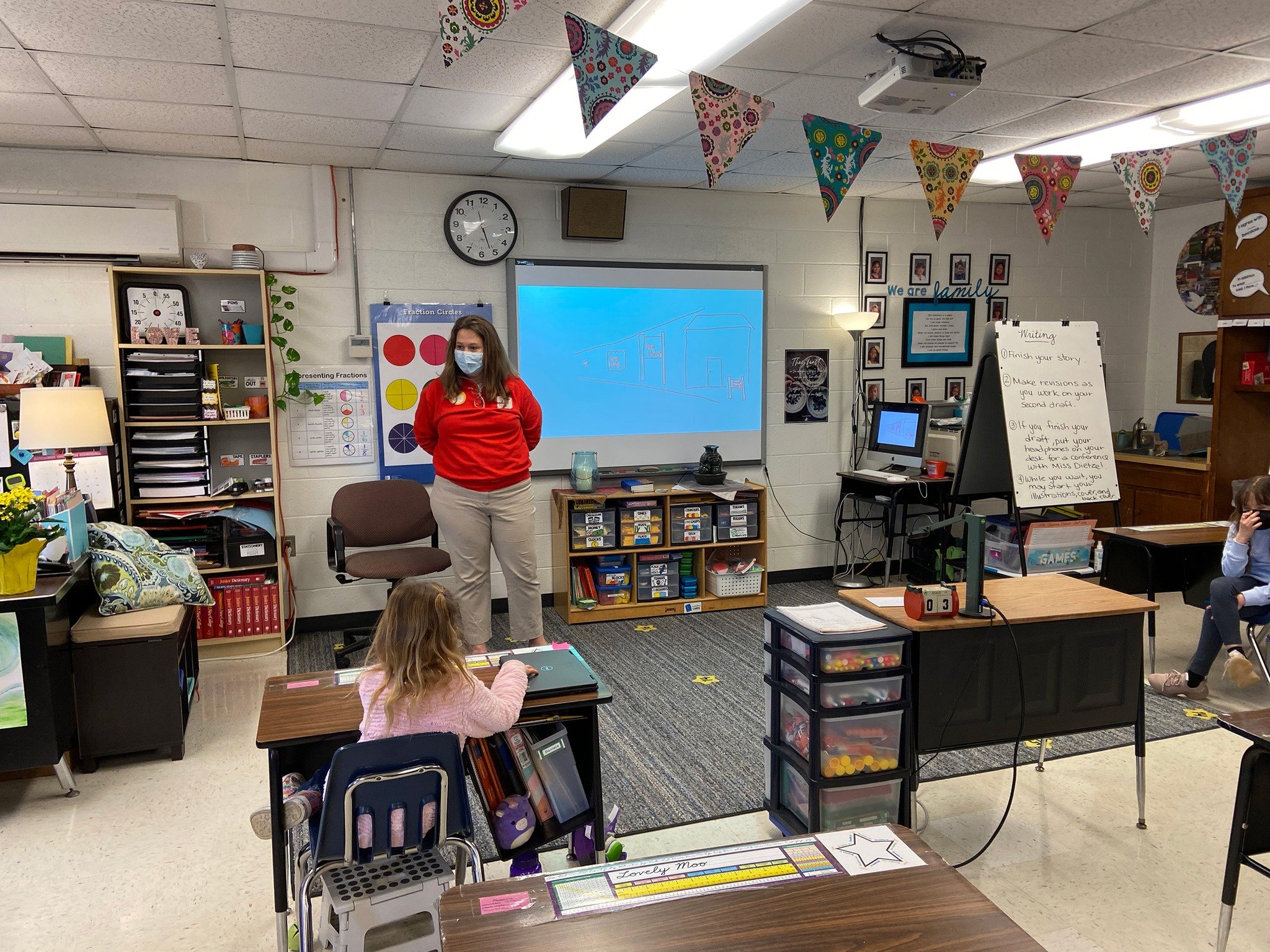 Teacher speaking to students