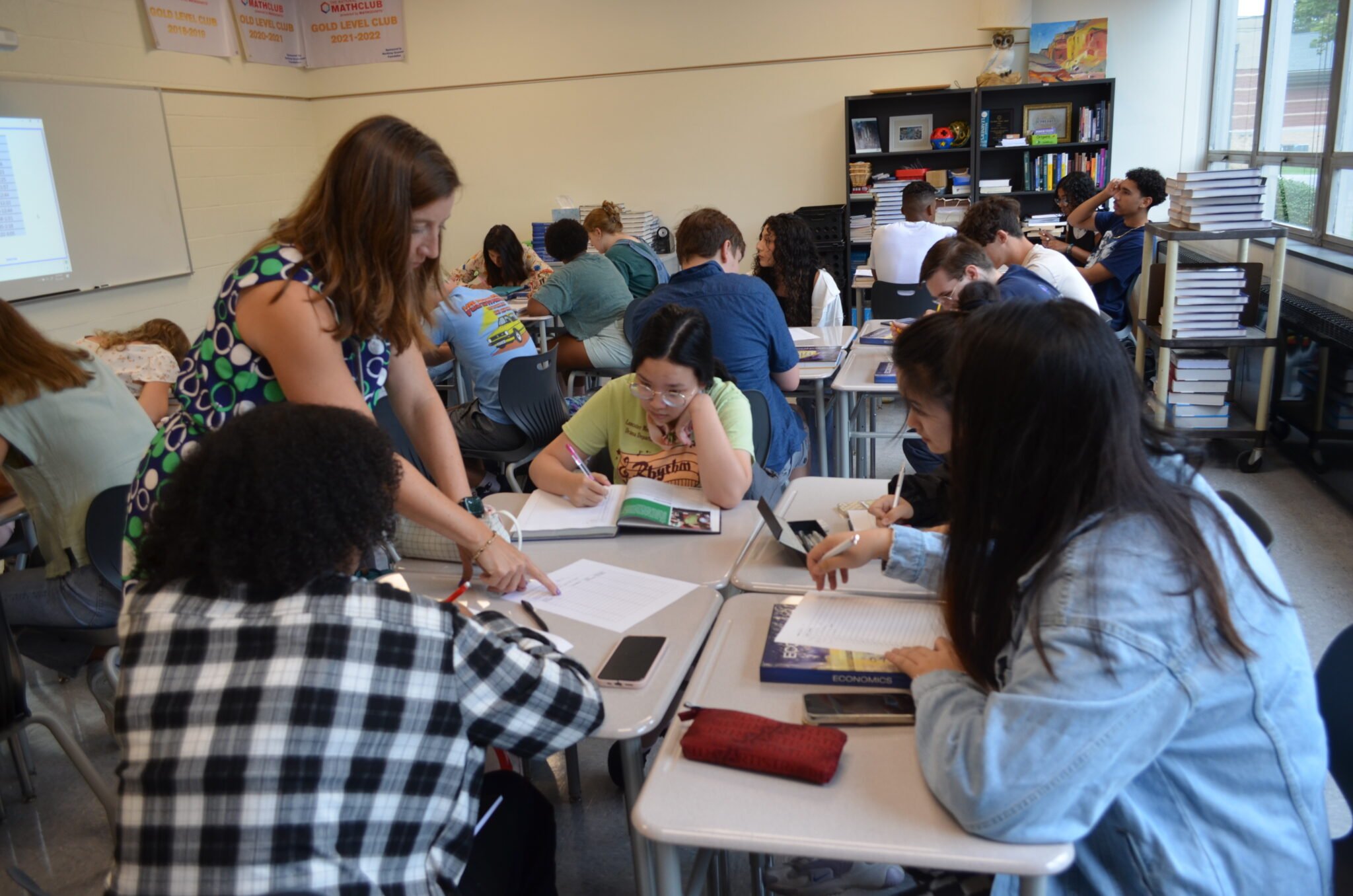 teacher with students at their desks