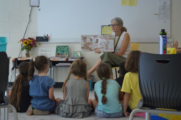 Teacher reading to class