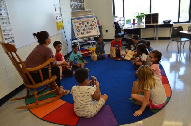 students sitting around a circle