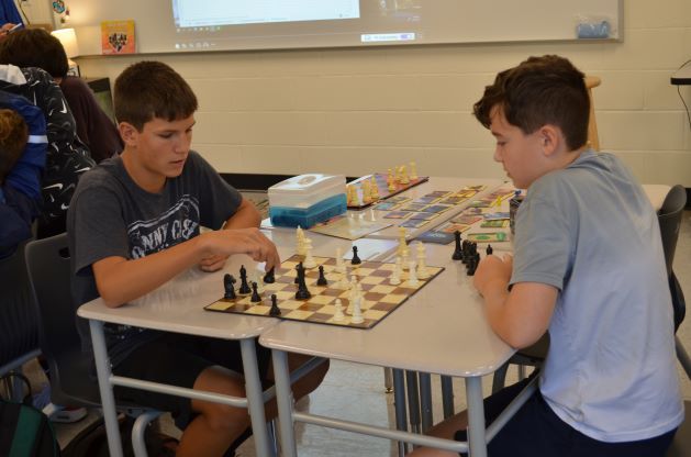 Two students playing chess