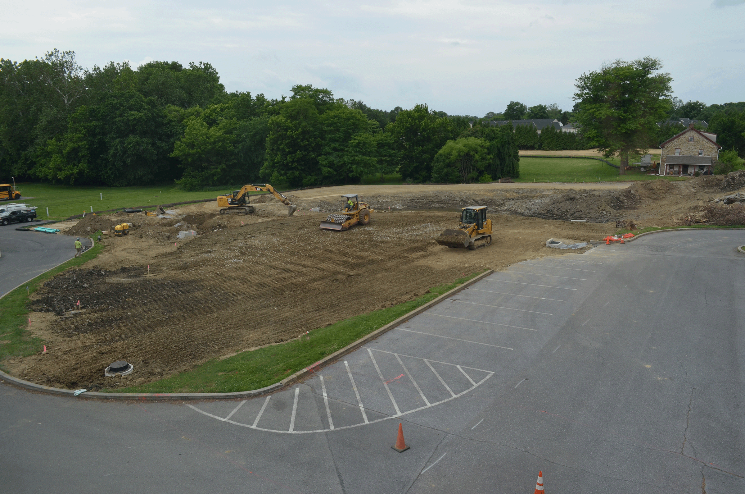 bulldozers clearing ground for playground