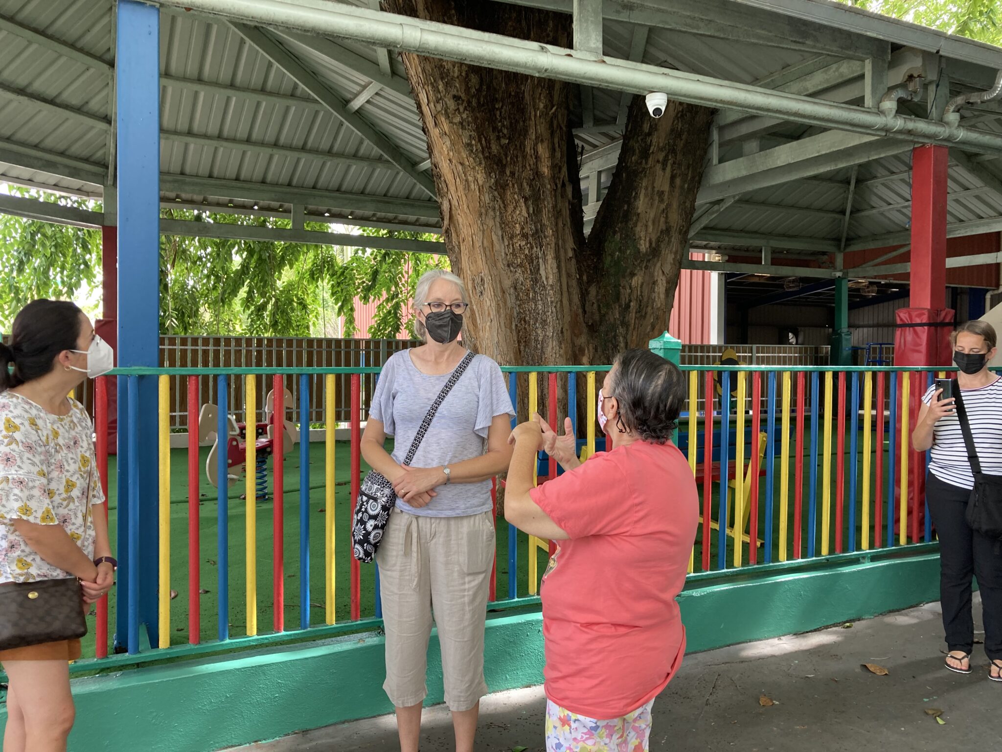 spanish teachers in front of pavilion