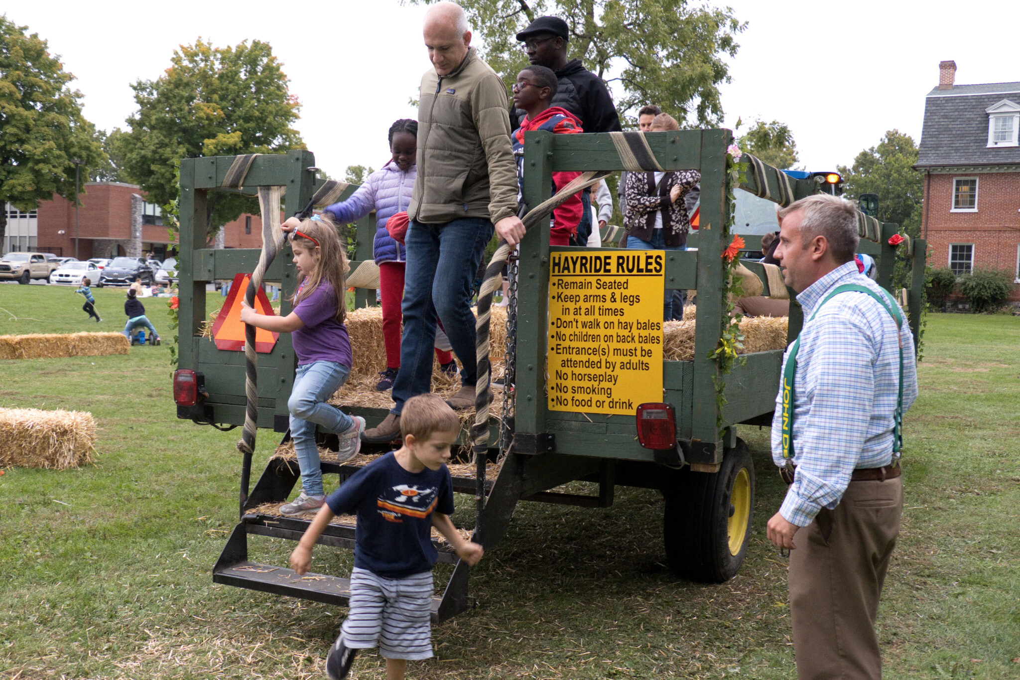 People exiting the hayride.