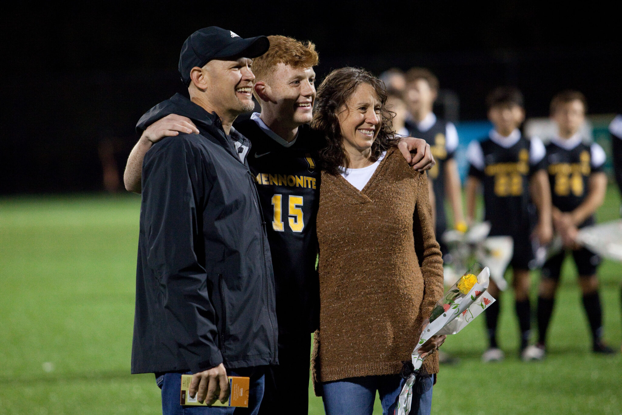 Soccer player with family