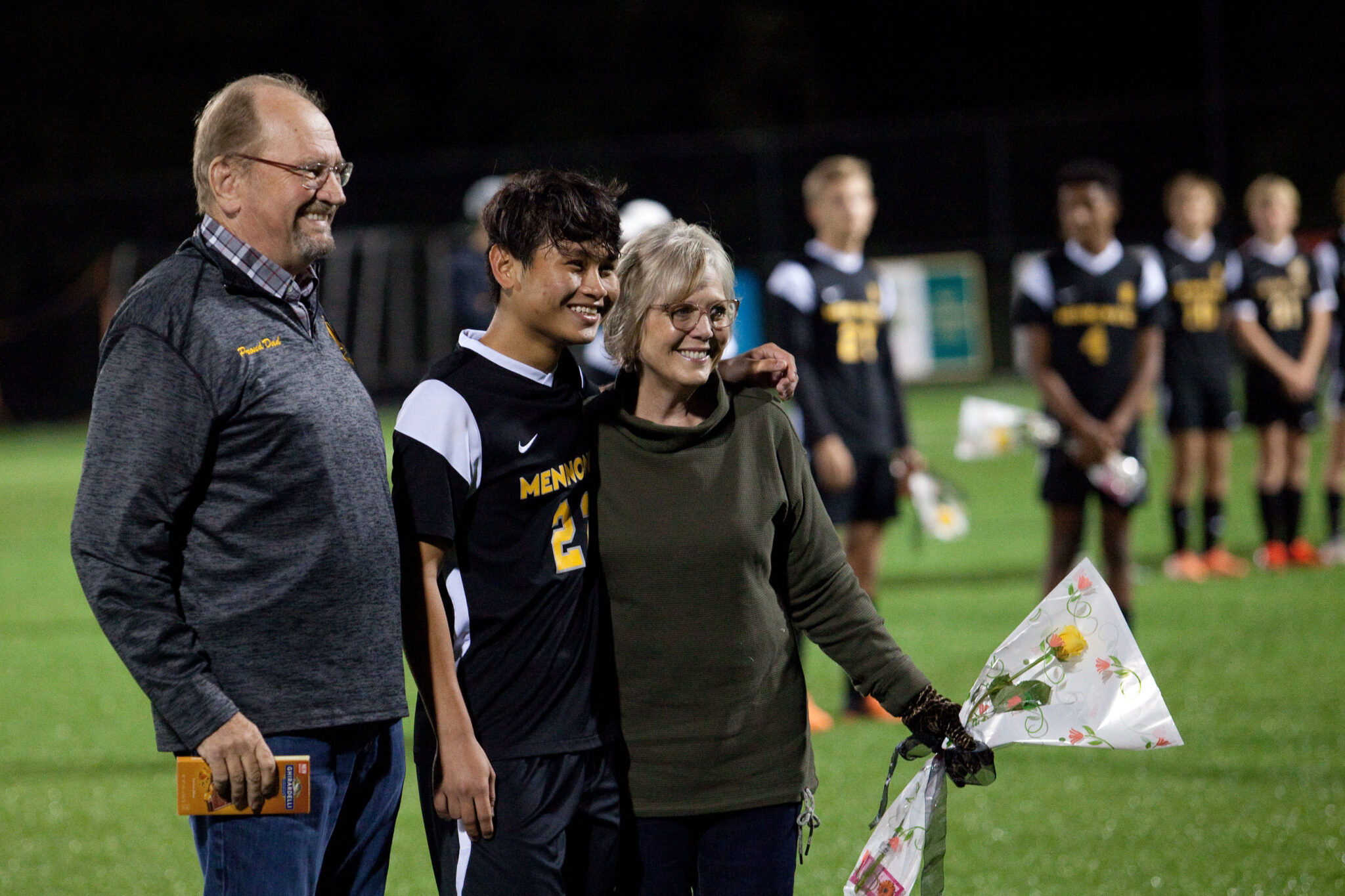 Soccer player with family