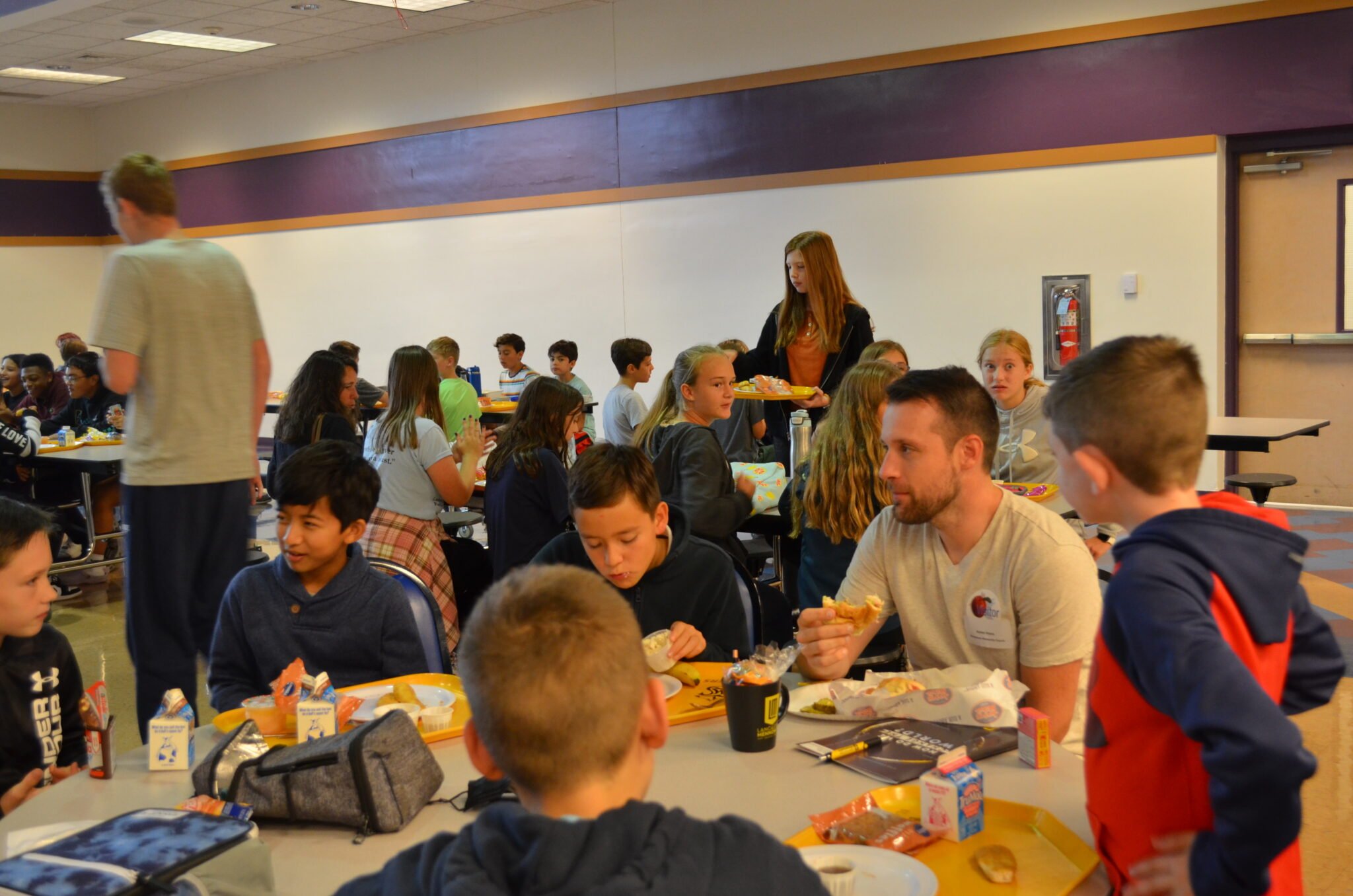 Pastor having lunch with students