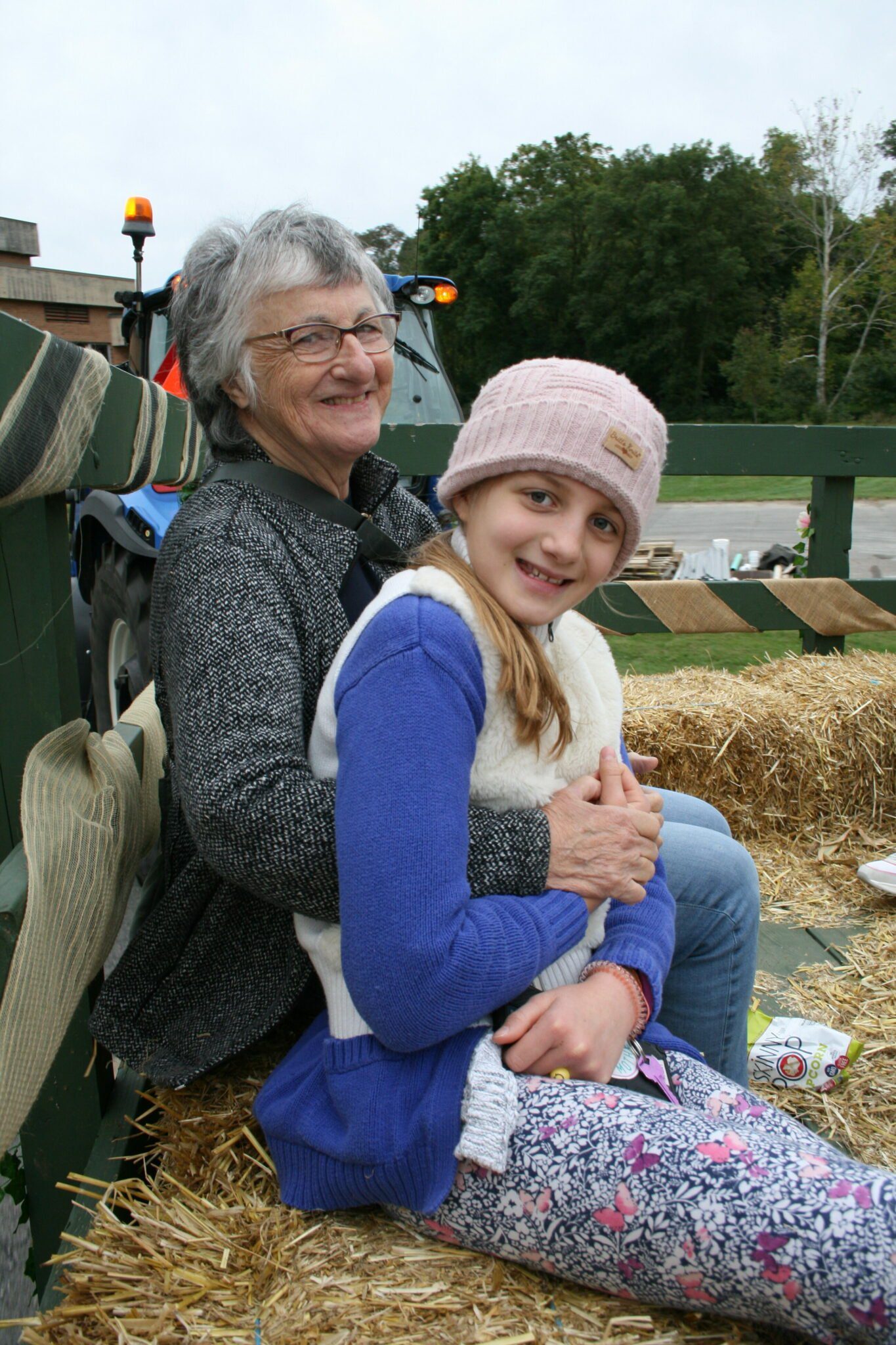 Two people on tractor ride.