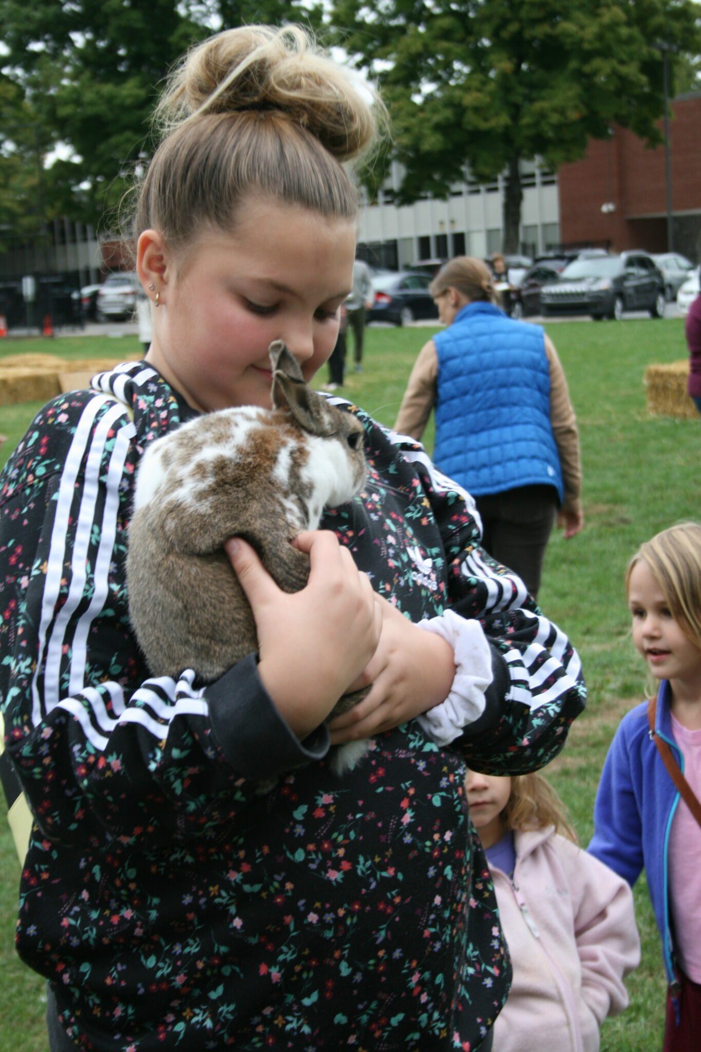 student holding bunny