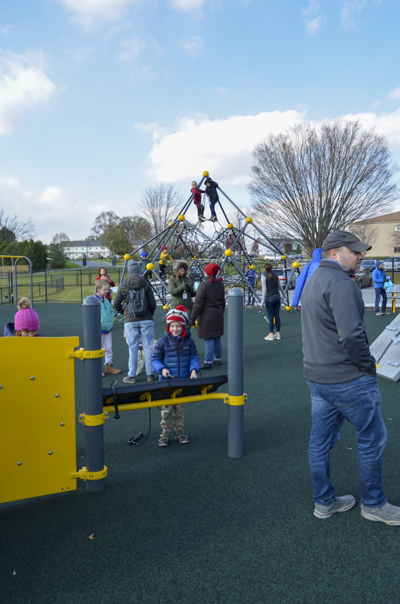 Elementary families playing on the playground