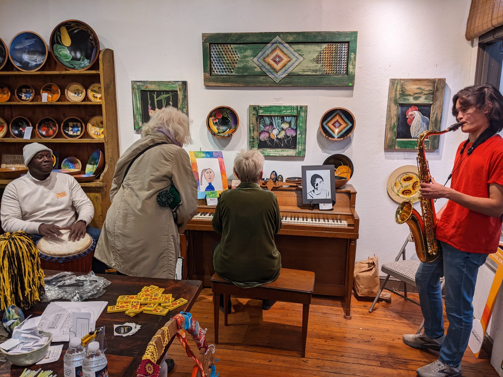 Students and Dr. Badriaki playing music during Extragive Event.