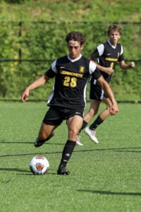 boys soccer players on the field