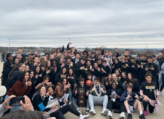 Boys' Basketball team and students at State Championships