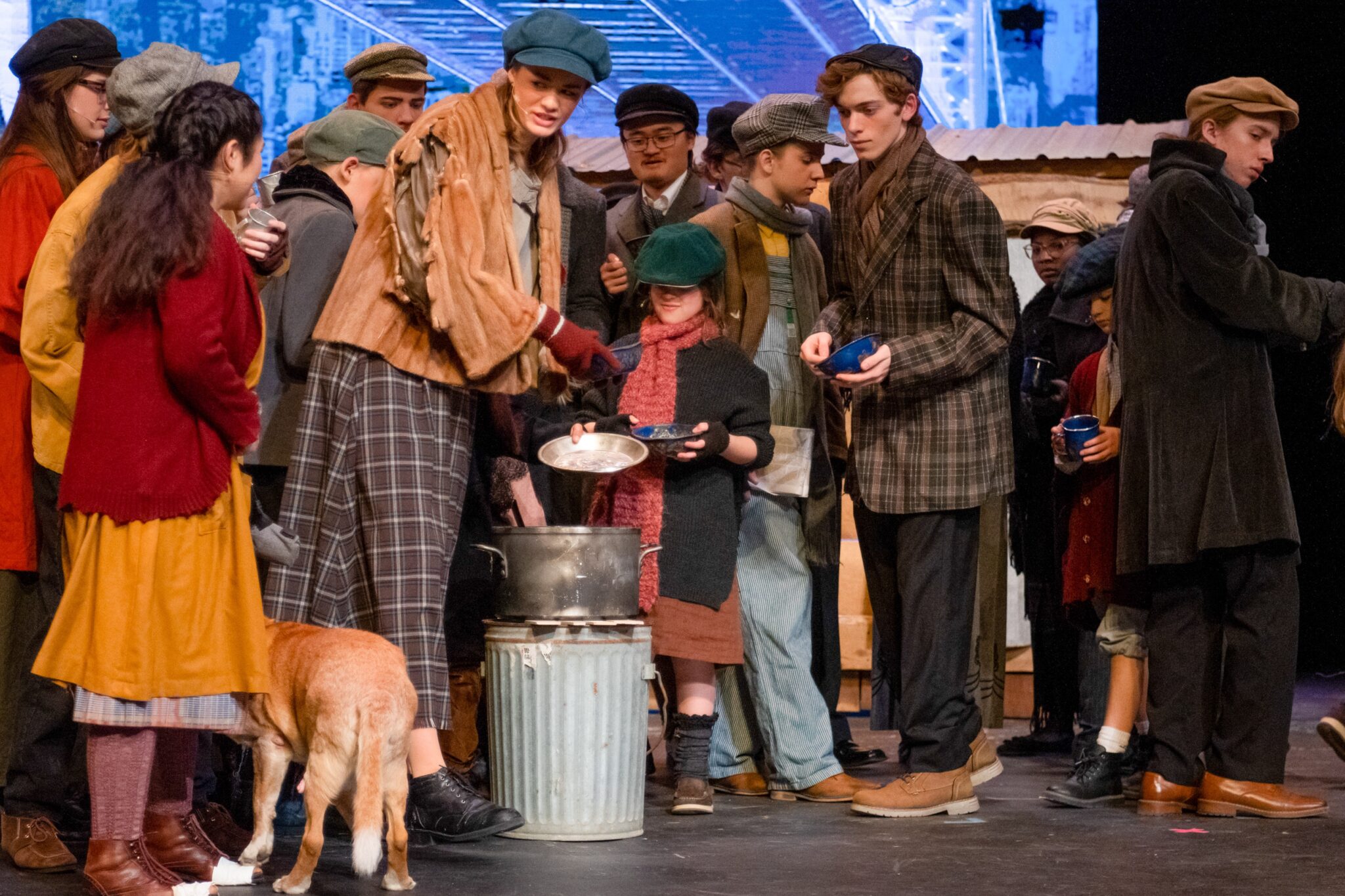 Students gathered round in Annie