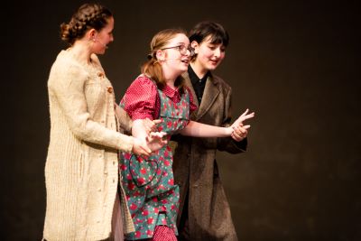 Three students on stage in Fantastic Mr. Fox