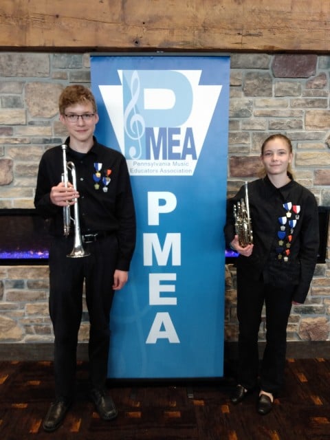 Two students with their instruments