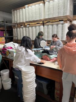 Students packaging boxes