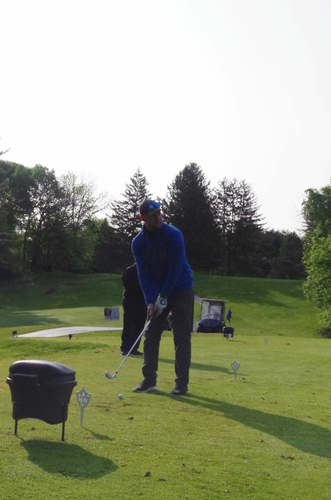 Golfer practicing before the golf tournament