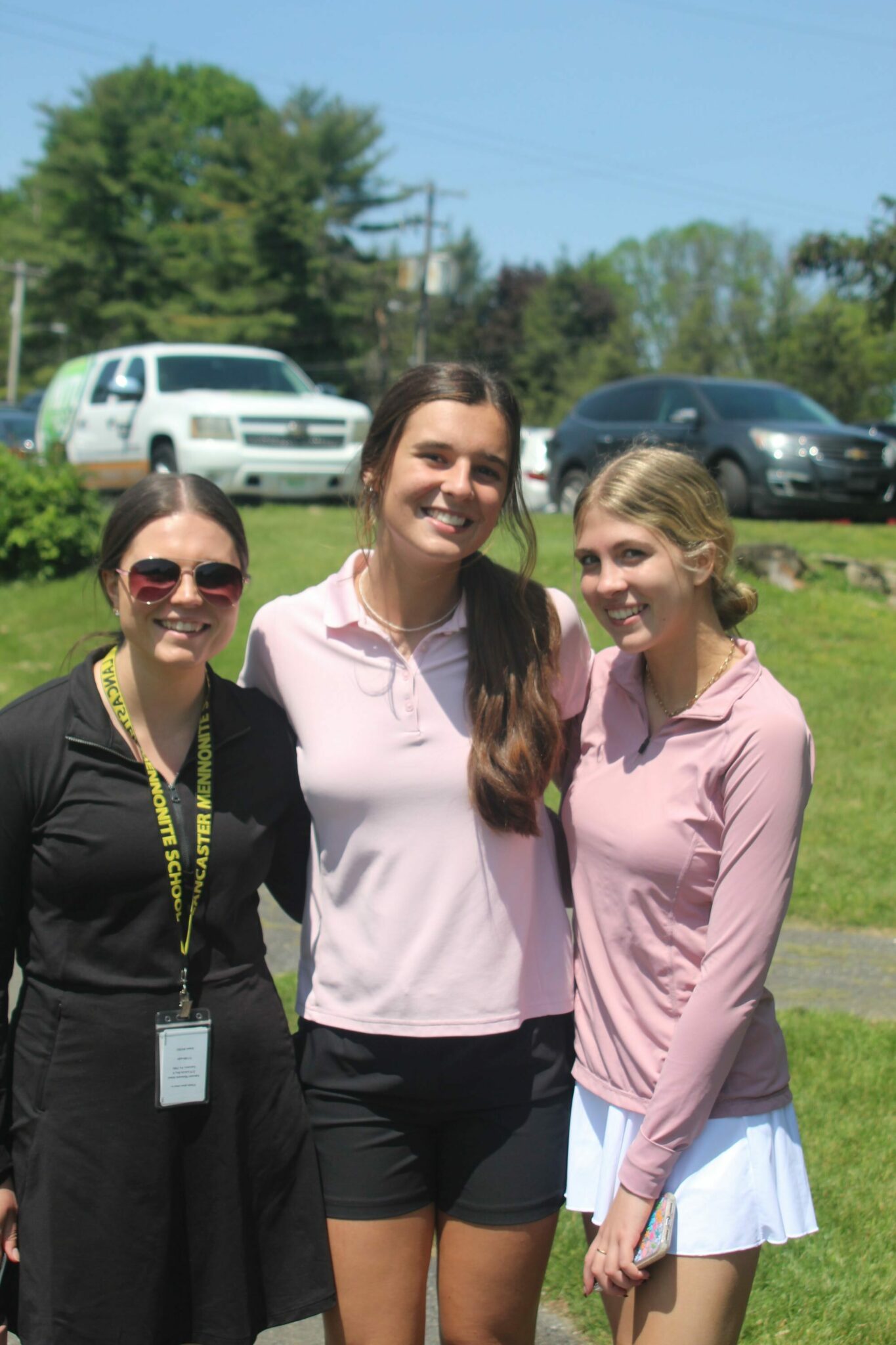 LM Teacher and students volunteering at the Golf Tournament