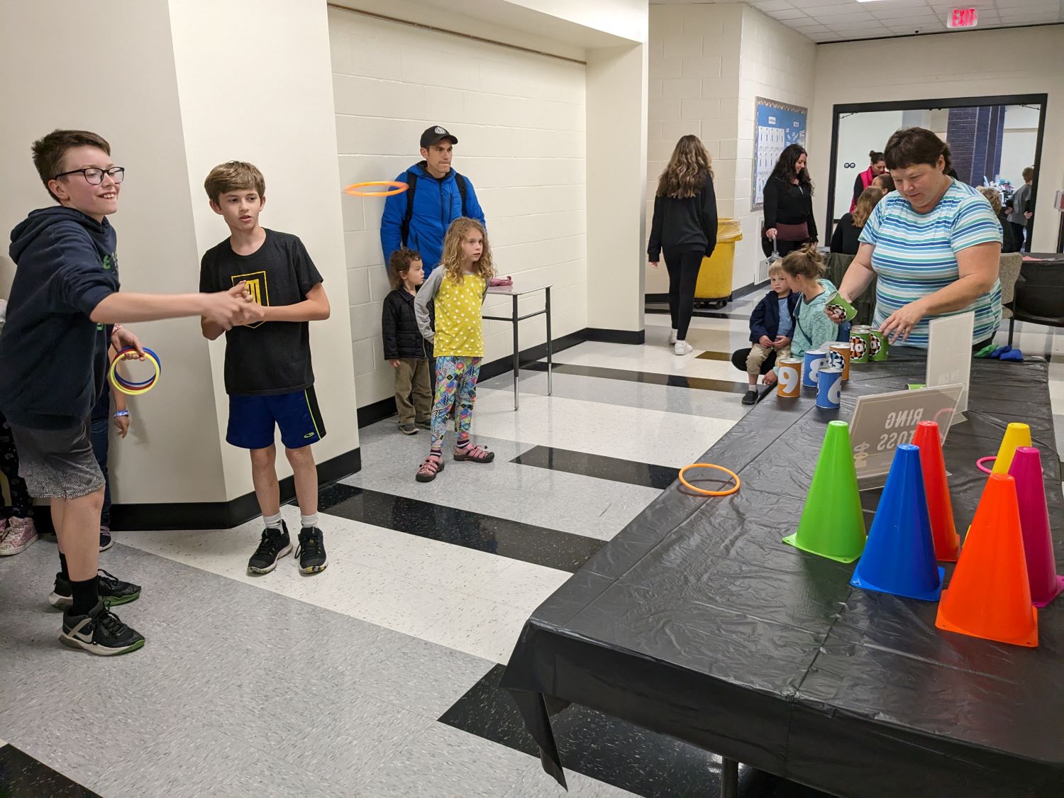 Students playing carnival games at the Spring Celebration