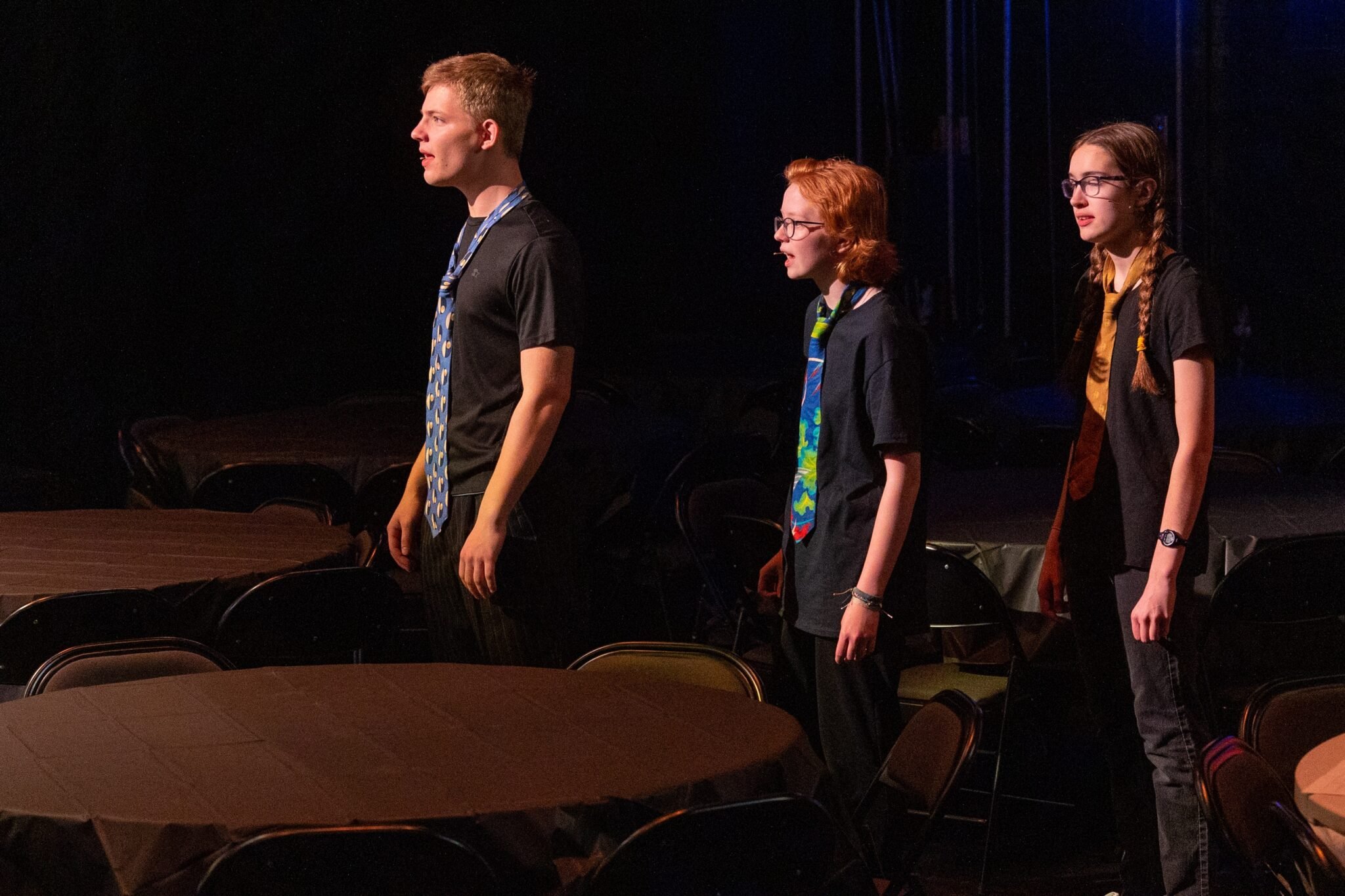 Students singing in production of 