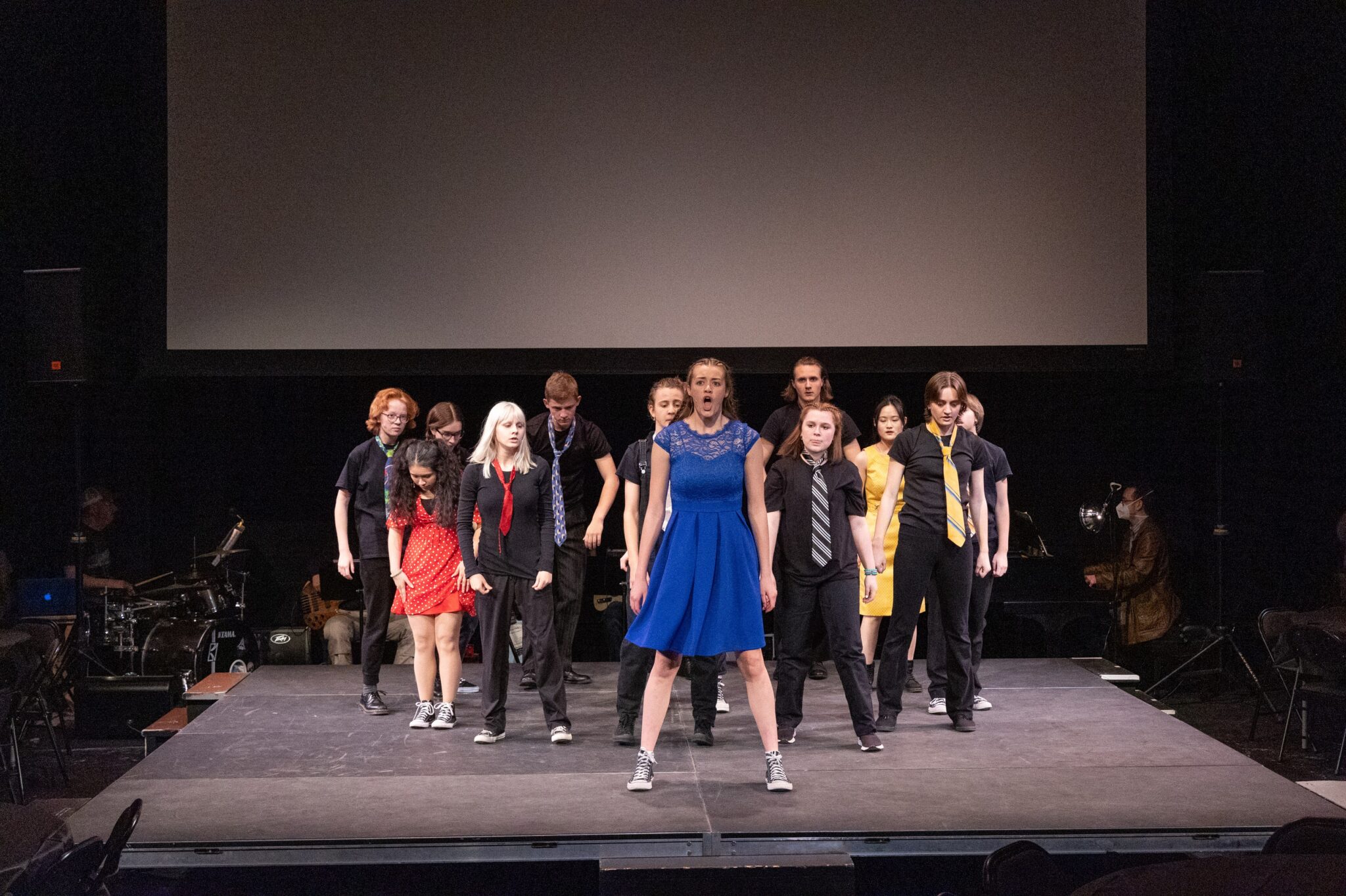 Students on stage during production of 
