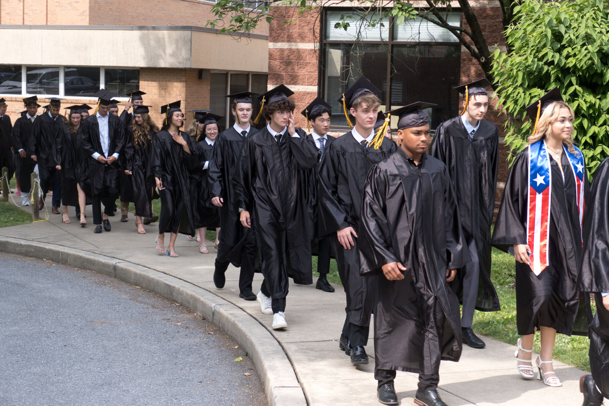 students walking to Fine Arts Center