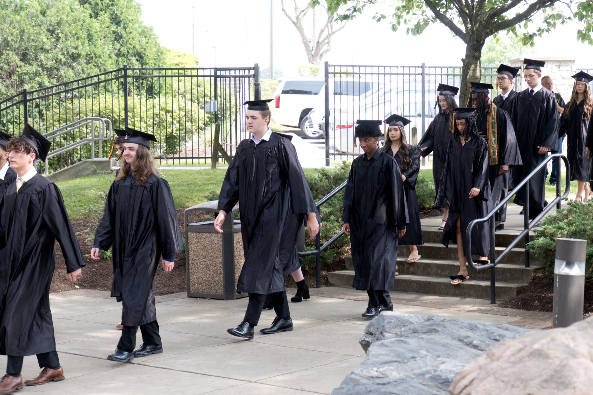 LM students walking into Fine Arts Center at Graduation