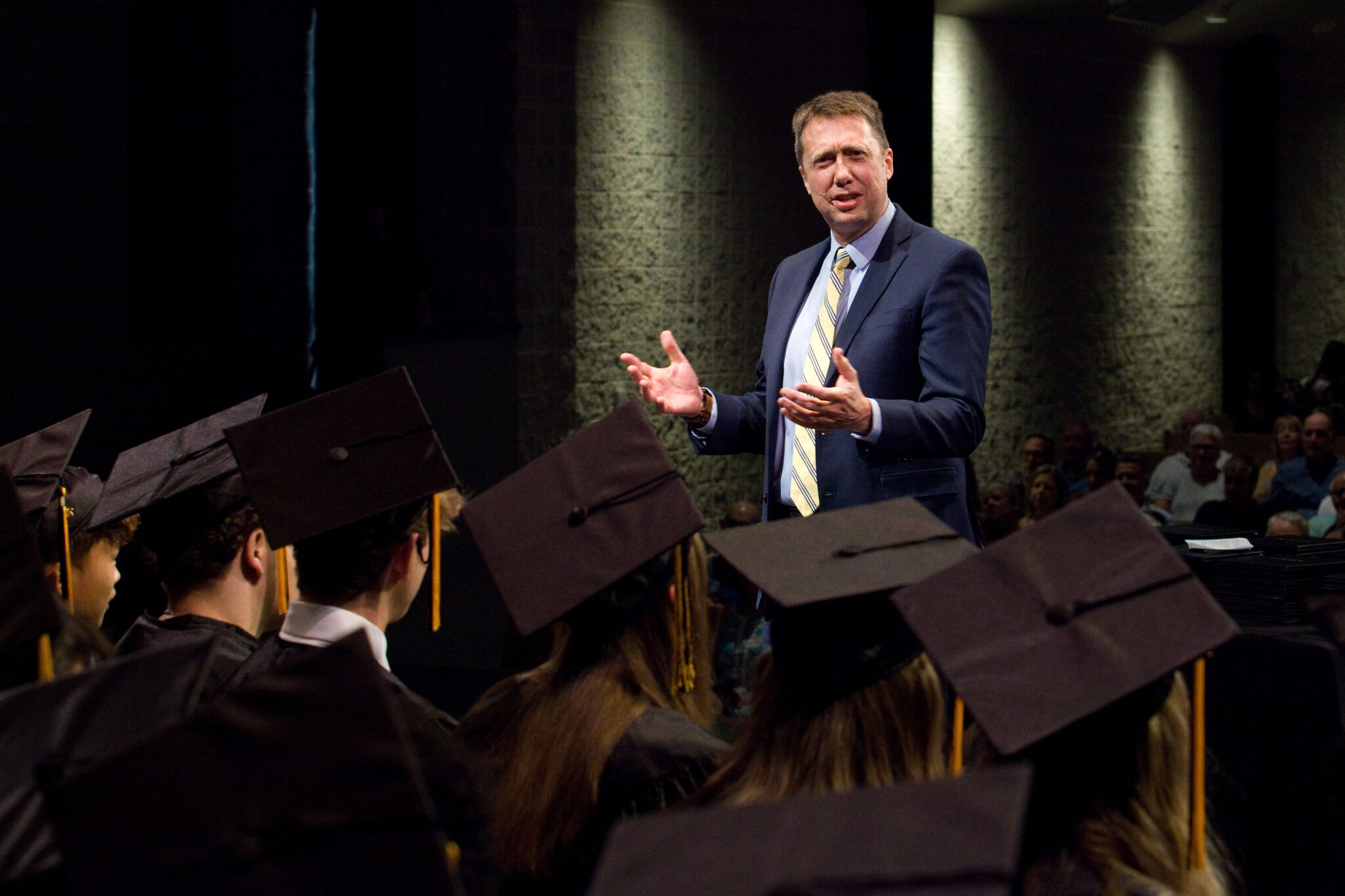 Graduation speaker talking to students
