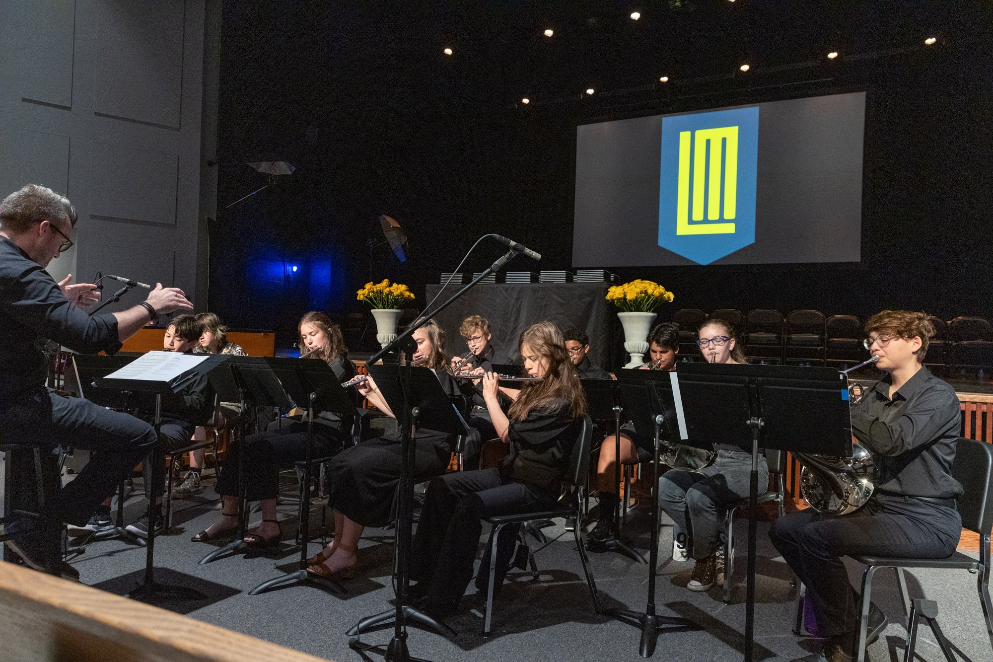 LM students on stage playing music
