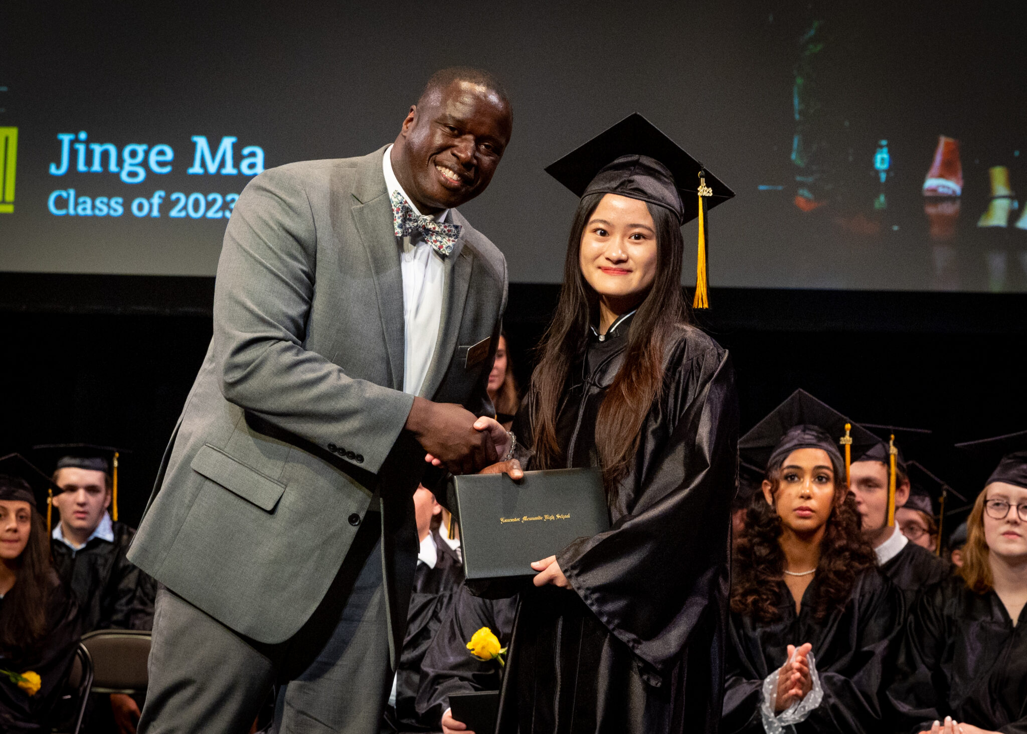 LM student receiving diploma at Graduation