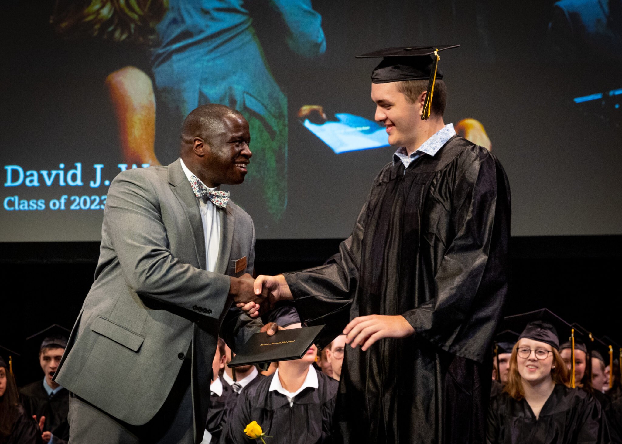 LM student receiving diploma at Graduation