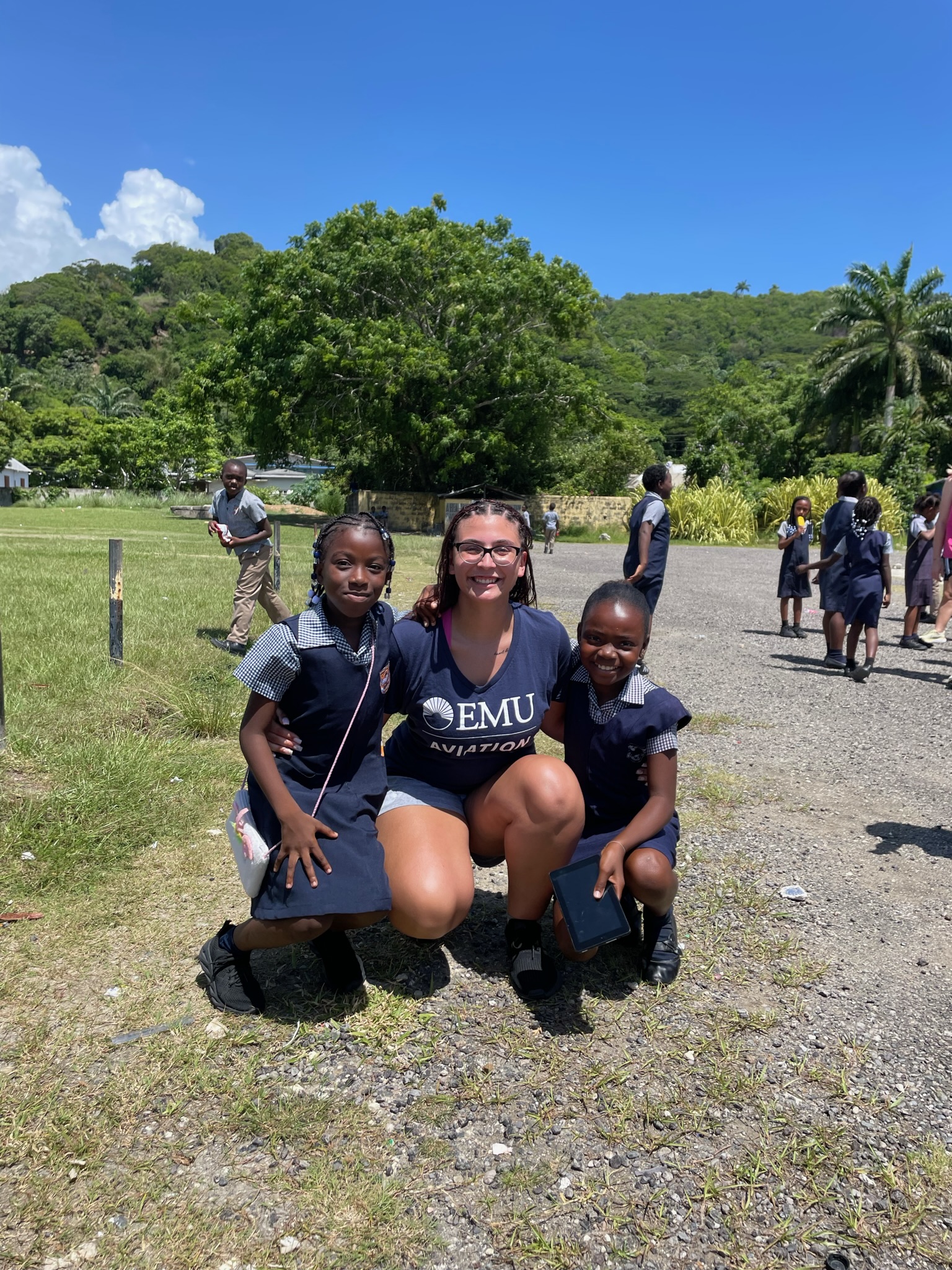 LM Varsity Girls Soccer Team in Jamaica with other students