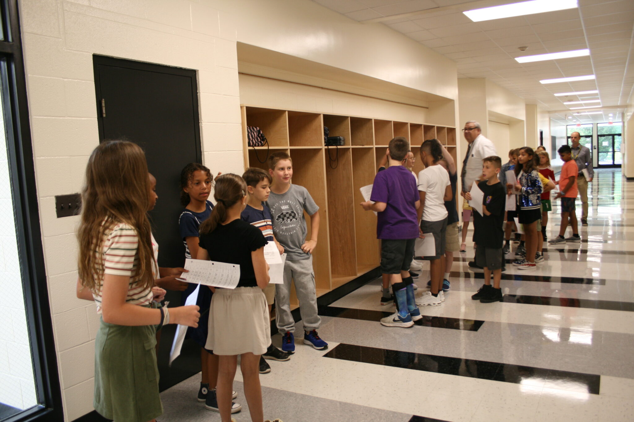 Middle school students at their cubbies