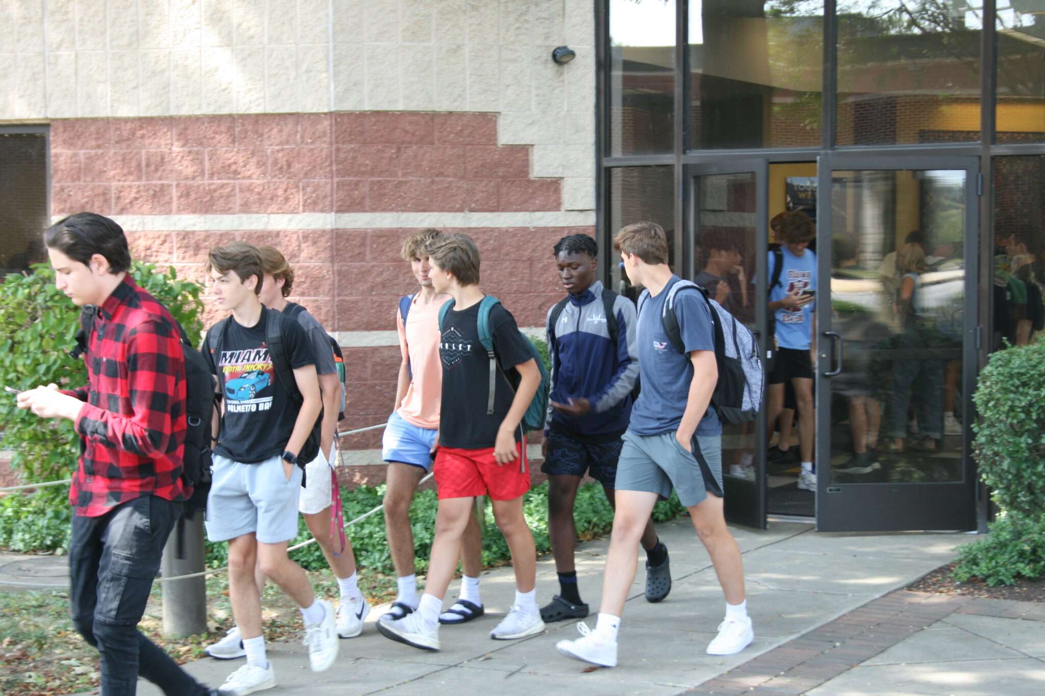 Students walking outside after Chapel