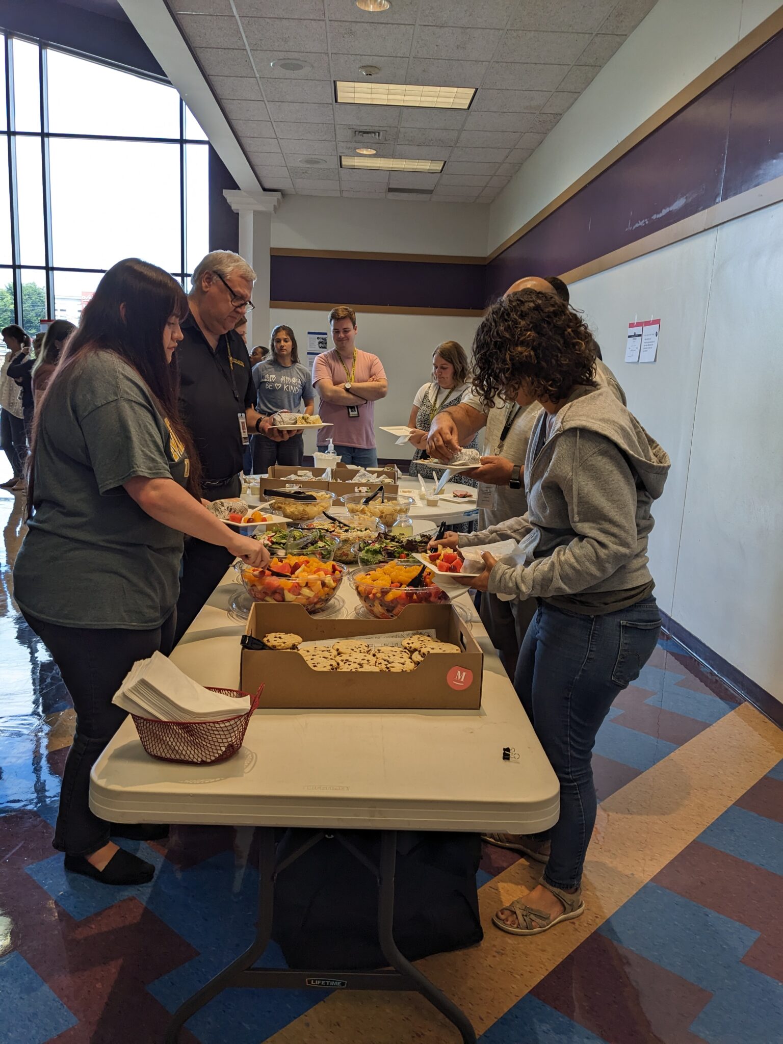Teachers getting lunch at professional development